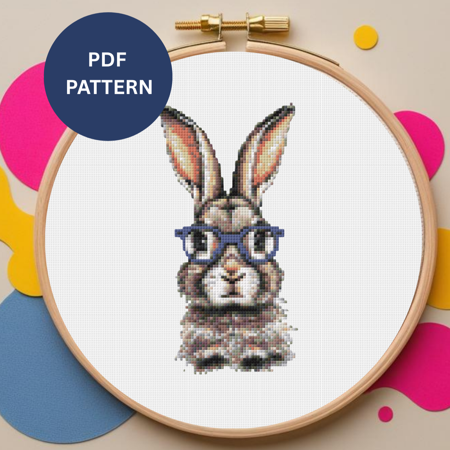 Embroidery hoop with rabbit wearing glasses in a beechwood embroidery hoop.